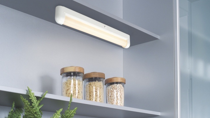 Clip-on lamp in a storage closet