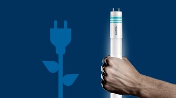 Una flor y un icono del cargador y una mano que sostiene un tubo LED