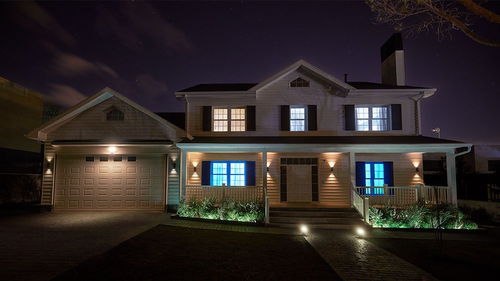 Couple using Amazon Alexa to turn on Philips Hue smart lights