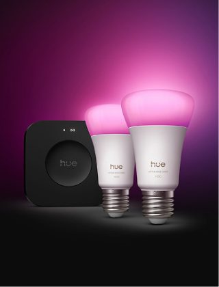 A Philips Hue starter kit including a Hue Bridge Pro smart home hub and two smart bulbs. 