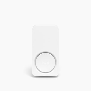 White rectangular smart chime with a round central button labeled ""hue,"" featuring a matte finish and compact design.