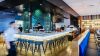 Cozy lighting around bar in restaurant