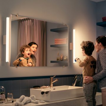Bathroom lighting: Mother and son in bathroom