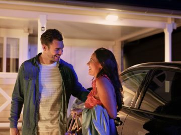 Man closing door as he leaves home
