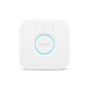 Square-shaped white smart lighting bridge with rounded edges, matte finish, central circular button, and three indicator lights above.