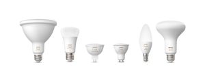 A collection of smart light bulbs in various shapes and sizes, all featuring white and color text on the product.