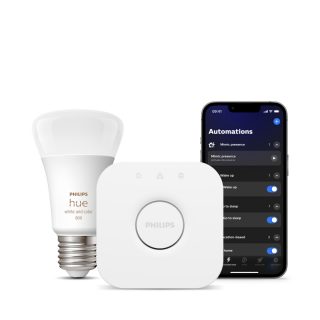 A set of smart lighting and security products including a bulb, hub, and mobile app displaying automation settings.