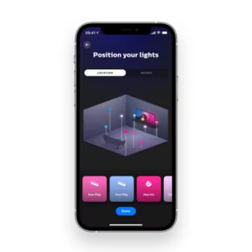 Funzione di configurazione di stanze virtuali dell'app Hue sullo schermo di un dispositivo mobile.